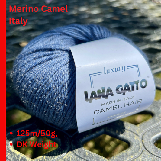 Ball of yarn with Lana Gatto label on a textured surface