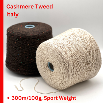 Gruppo Tessile Industriale WEB TWEED Italian cashmere yarn shown on professional cones. This 100% carded cashmere sport weight yarn features a subtle, modern tweed texture and soft loft. Premium luxury designer yarn available at iDOKNiT.com.