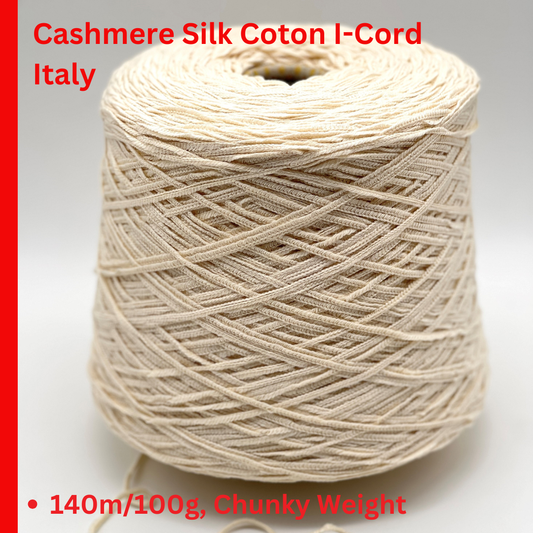 Filati Biagioli Modesto SUGHERO chunky i-cord yarn in 1932 IVORY. This luxury Italian blend of cashmere, silk, and cotton features a soft, rounded chainette structure on a professional cone. High-end designer yarn available at iDOKNiT.com.