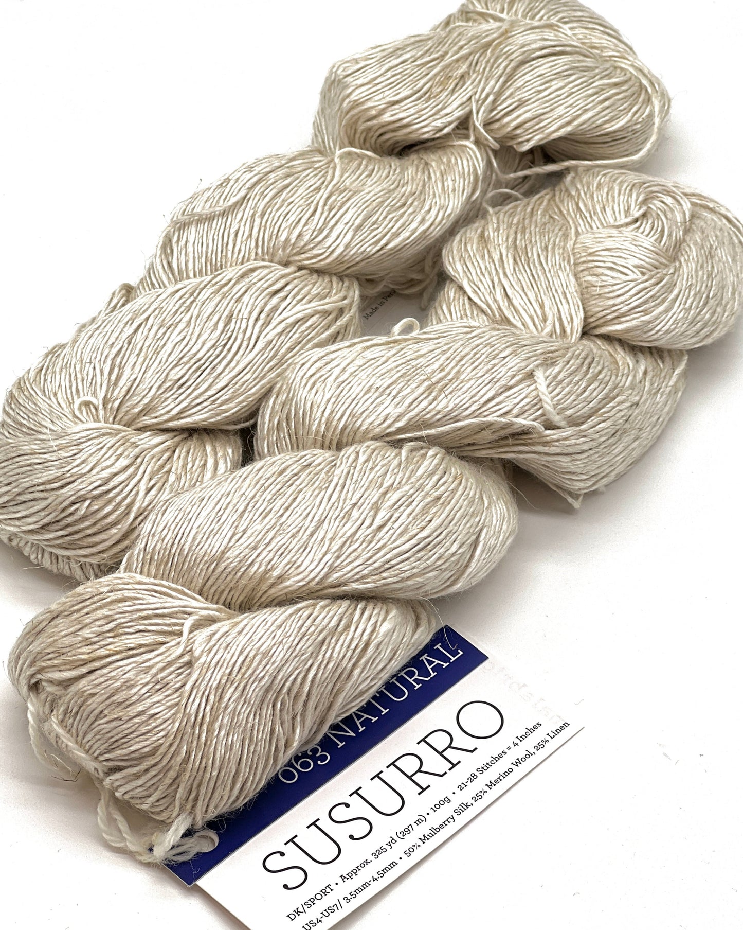 Premium iDOKNiT DK Sport weight yarn, SUSURRO by Malabrigo Peru. Luxury blend of 50% mulberry silk, 25% merino wool, and 25% linen, 297m/100g. Hand-dyed authentic Peruvian yarn curated by iDOKNiT for lightweight garments with elegant drape and sophisticated linen texture.