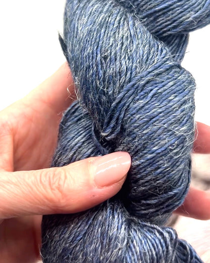 Premium iDOKNiT DK Sport weight yarn, SUSURRO by Malabrigo Peru. Luxury blend of 50% mulberry silk, 25% merino wool, and 25% linen, 297m/100g. Hand-dyed authentic Peruvian yarn curated by iDOKNiT for lightweight garments with elegant drape and sophisticated linen texture.