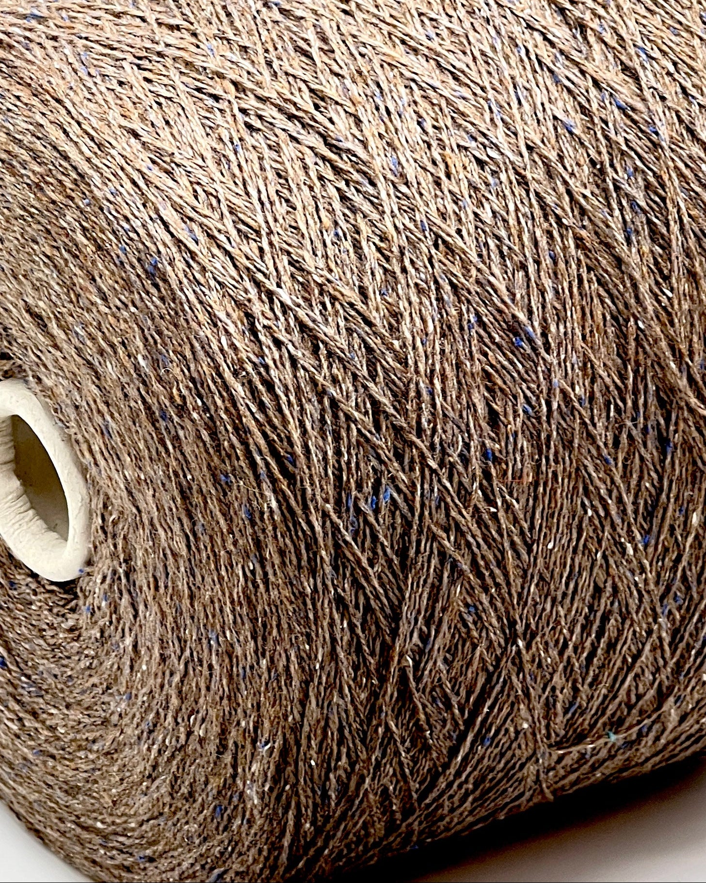 Exclusive iDOKNiT lace weight tweed yarn, PIGALLE by RiGo Italy. A complex luxury blend of 40% virgin wool, 20% silk, and 15% viscose, 750m/100g. Authentic Italian-made tweed with sophisticated multi-fiber texture and subtle silk sheen, curated by iDOKNiT for high-end, lightweight knitwear.