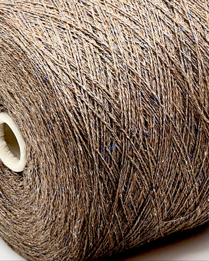 Exclusive iDOKNiT lace weight tweed yarn, PIGALLE by RiGo Italy. A complex luxury blend of 40% virgin wool, 20% silk, and 15% viscose, 750m/100g. Authentic Italian-made tweed with sophisticated multi-fiber texture and subtle silk sheen, curated by iDOKNiT for high-end, lightweight knitwear.