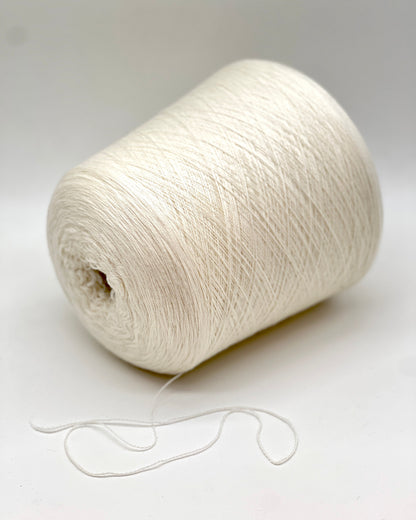 Elite iDOKNiT extra fine lace weight yarn, MASCOTTE by RiGo Italy. Luxury blend of 20% cashmere and 80% merino wool, Nm 2/30, providing 1500m per 100g. Authentic Italian-made yarn in 2153 Ecru Natural, curated by iDOKNiT for delicate lace knitting and high-end, ultra-soft garments.