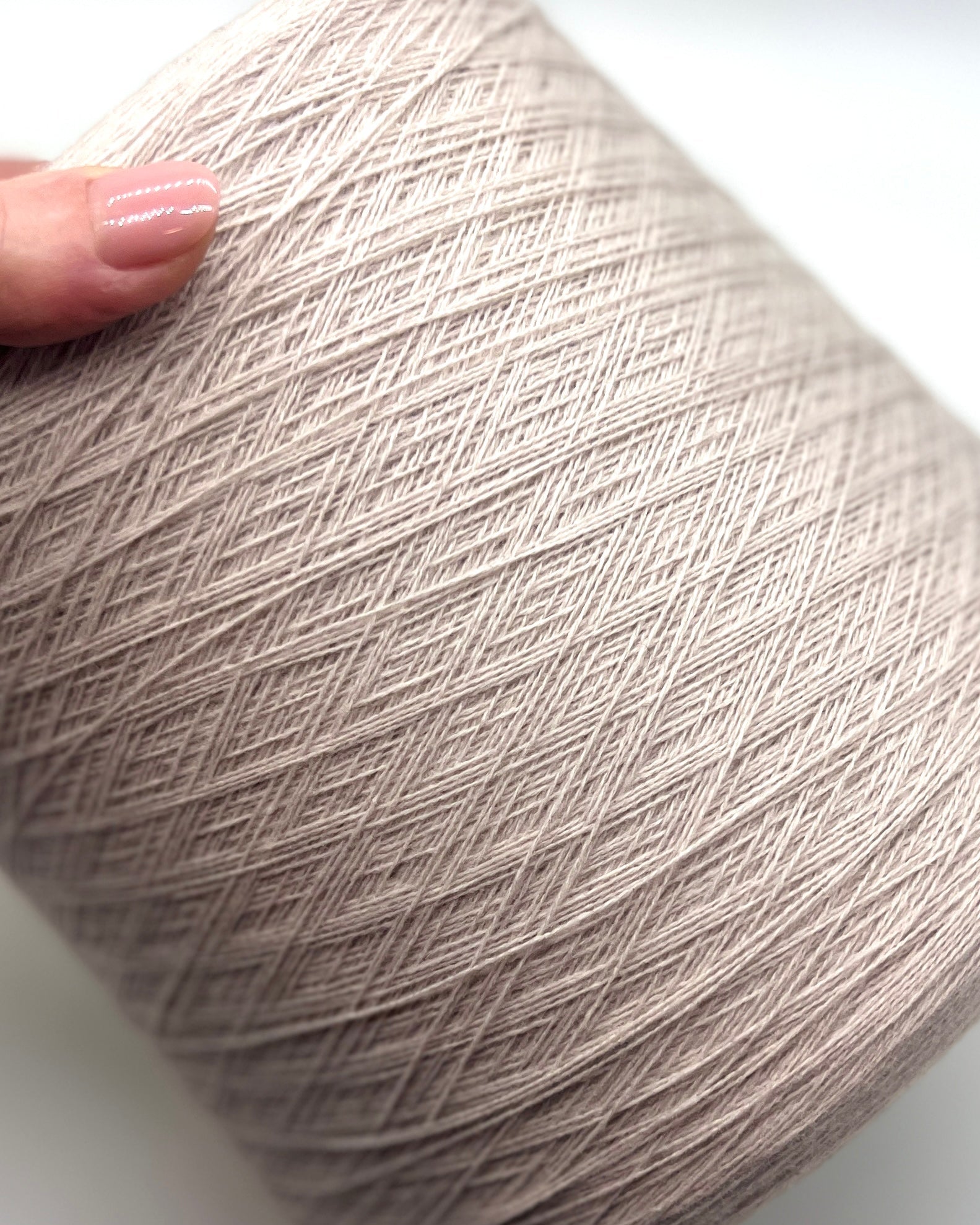 Exclusive iDOKNiT lace weight cashmere yarn, Cashmere 100 by Cariaggi Italy. Rare luxury surplus from Dior Accessori S.p.A. production. 100% pure cashmere in a classic Nm 2/28 count, providing 1400m per 100g. Authentic Italian-made luxury fiber curated by iDOKNiT for high-end fashion-grade lace projects and multi-strand knitting.
