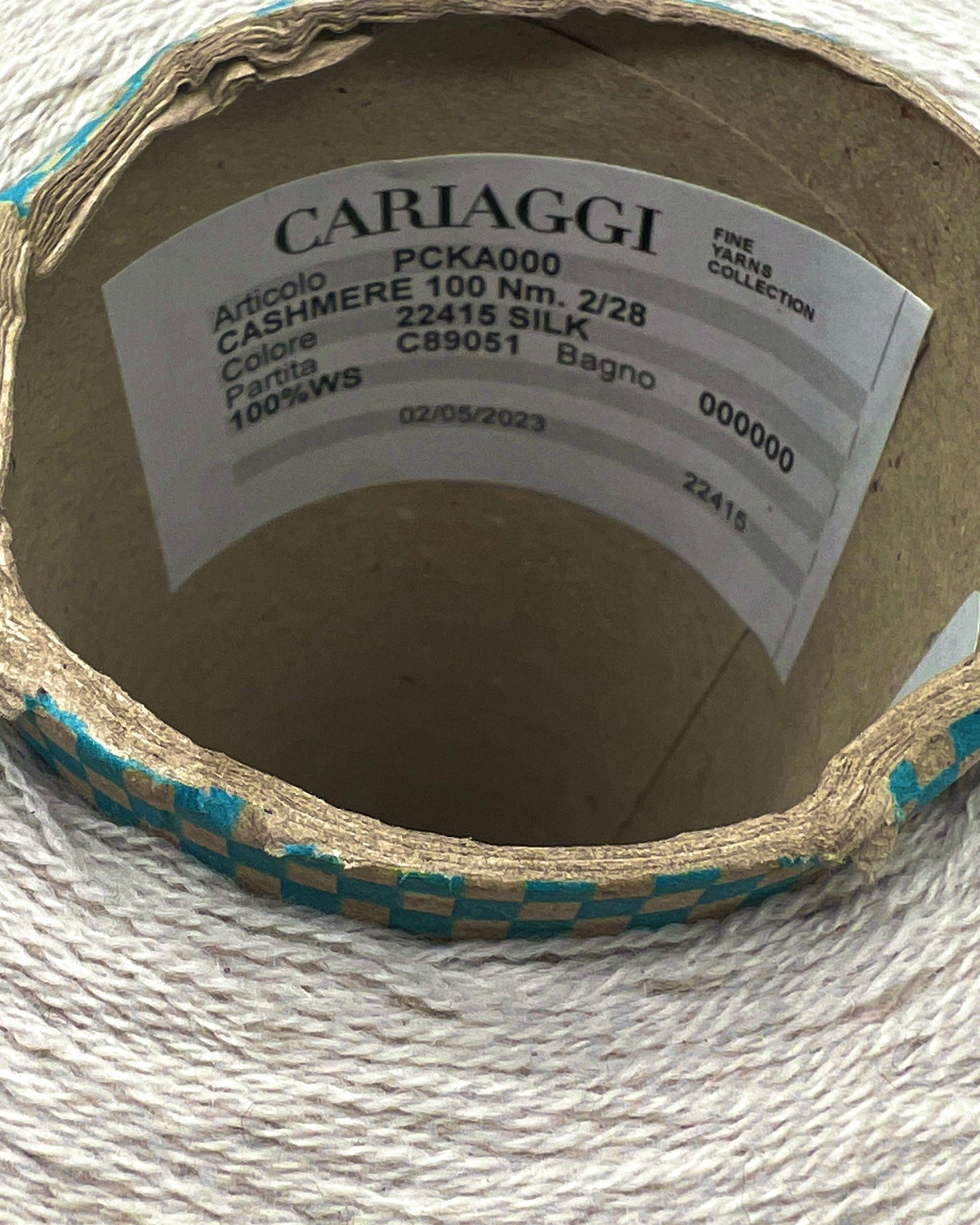 Exclusive iDOKNiT lace weight cashmere yarn, Cashmere 100 by Cariaggi Italy. Rare luxury surplus from Dior Accessori S.p.A. production. 100% pure cashmere in a classic Nm 2/28 count, providing 1400m per 100g. Authentic Italian-made luxury fiber curated by iDOKNiT for high-end fashion-grade lace projects and multi-strand knitting.