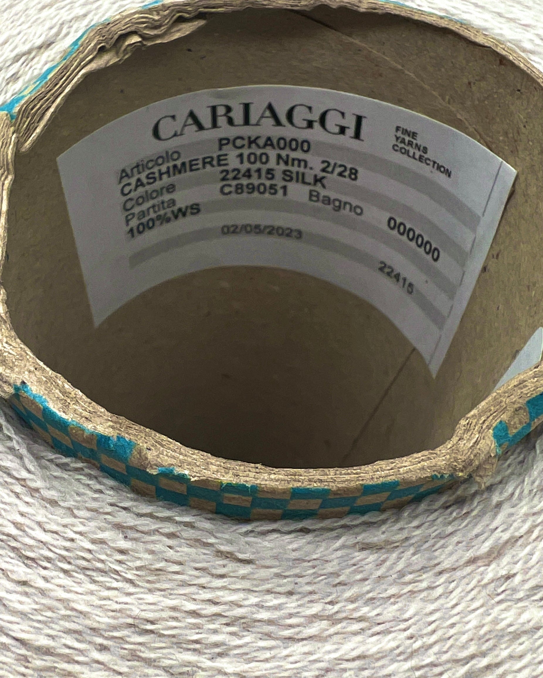 Exclusive iDOKNiT lace weight cashmere yarn, Cashmere 100 by Cariaggi Italy. Rare luxury surplus from Dior Accessori S.p.A. production. 100% pure cashmere in a classic Nm 2/28 count, providing 1400m per 100g. Authentic Italian-made luxury fiber curated by iDOKNiT for high-end fashion-grade lace projects and multi-strand knitting.