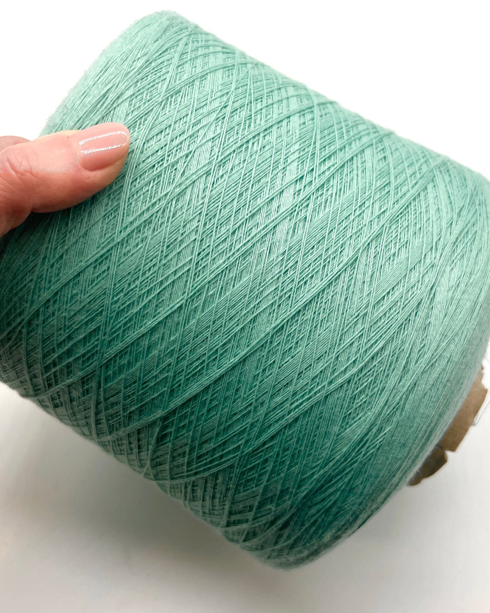 Sustainable iDOKNiT fine weight yarn, 100% Polyester by Filartex S.p.A. Italy. High-quality 3-ply construction with GRS certified recycled-material standards. Authentic Italian-made durable yarn in 2172 Light Mint, curated by iDOKNiT for eco-conscious crafting and professional-grade machine or hand knitting.