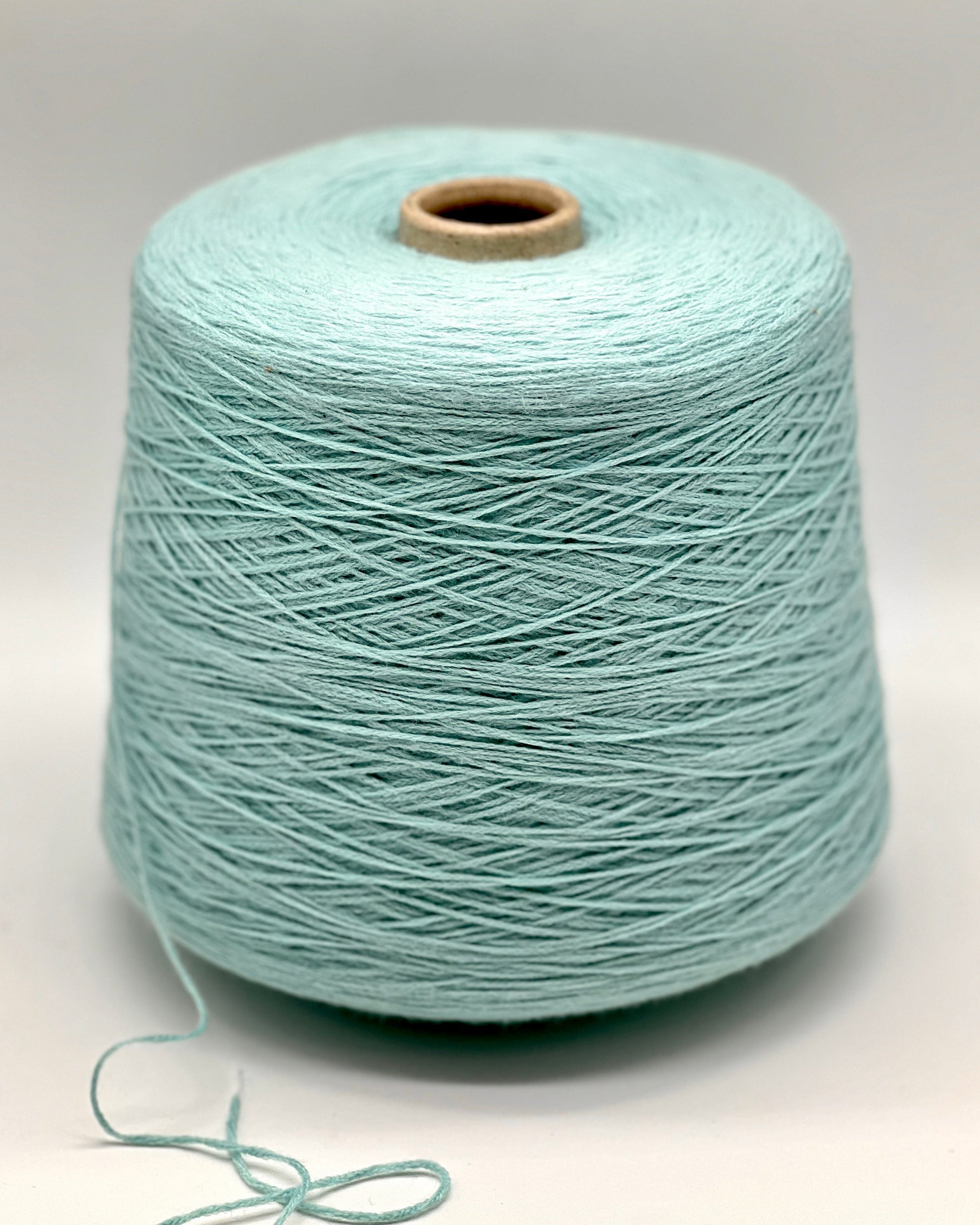 Elite iDOKNiT lace weight stretch yarn, SCOOBYGUM by Pecci Filati Italy. High-performance blend of 75% Cotton Makò and 25% Elastane, Nm 6500, providing 650m per 100g. Authentic Italian-made yarn in 2173 Pale Aqua, curated by iDOKNiT for lightweight garments requiring excellent elasticity, comfort, and shape retention.