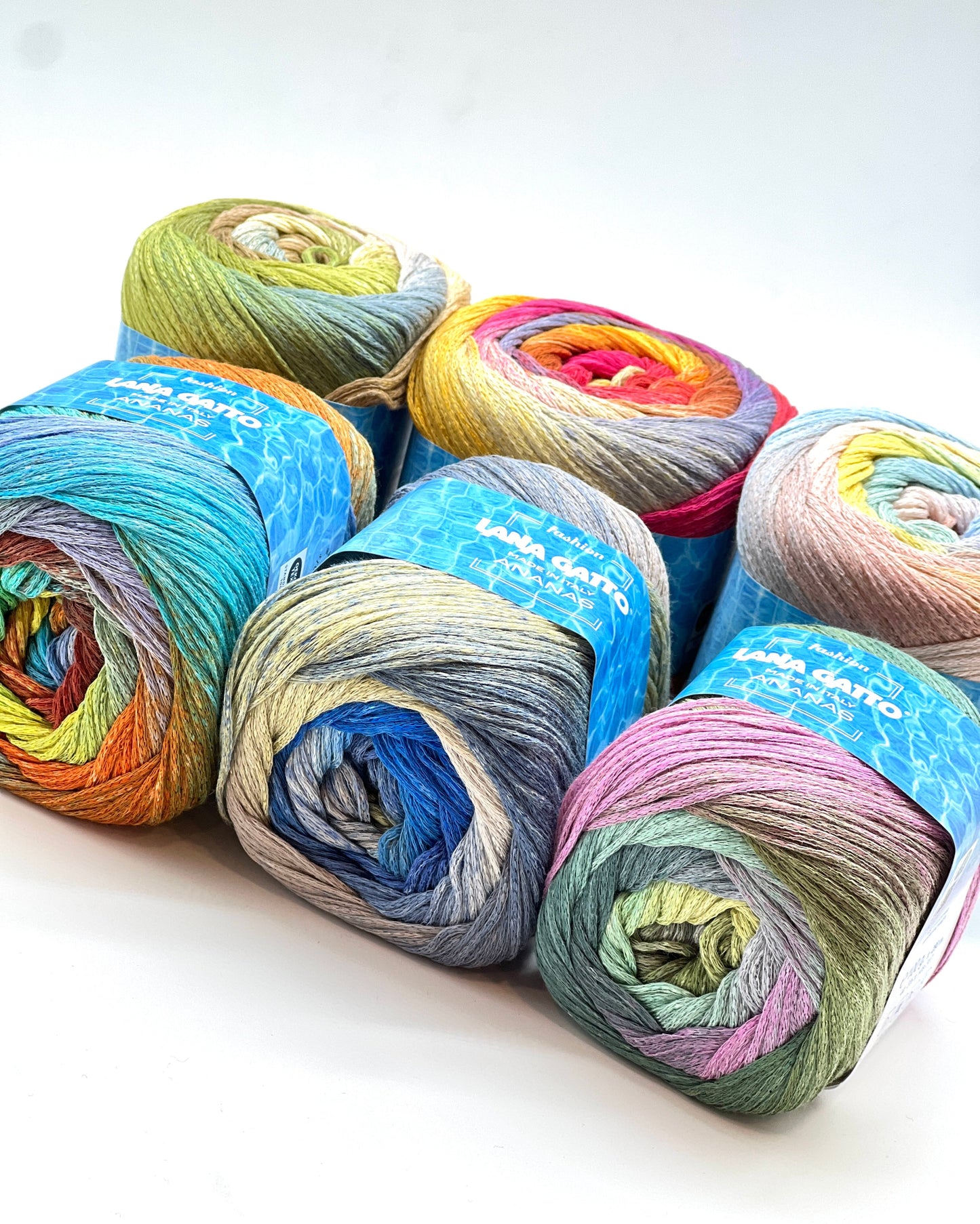 Exclusive iDOKNiT sport weight summer yarn, ANANAS by Lana Gatto Italy. A vibrant Fashion Collection 2026 blend of 75% cotton and 25% viscose, providing 290m per 100g ball. Authentic Italian-made luxury fiber curated by iDOKNiT for breathable, eco-friendly garments with a bold multicolour character and soft, fluid drape.