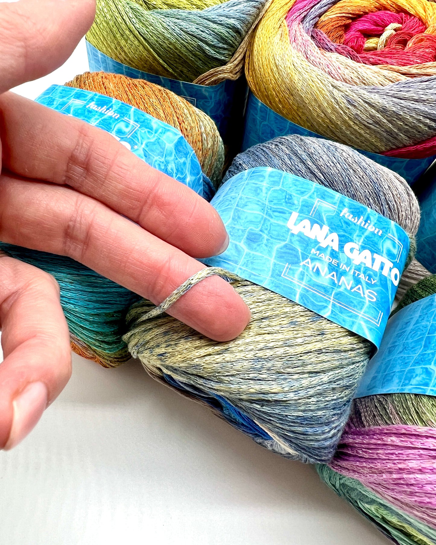 Exclusive iDOKNiT sport weight summer yarn, ANANAS by Lana Gatto Italy. A vibrant Fashion Collection 2026 blend of 75% cotton and 25% viscose, providing 290m per 100g ball. Authentic Italian-made luxury fiber curated by iDOKNiT for breathable, eco-friendly garments with a bold multicolour character and soft, fluid drape.