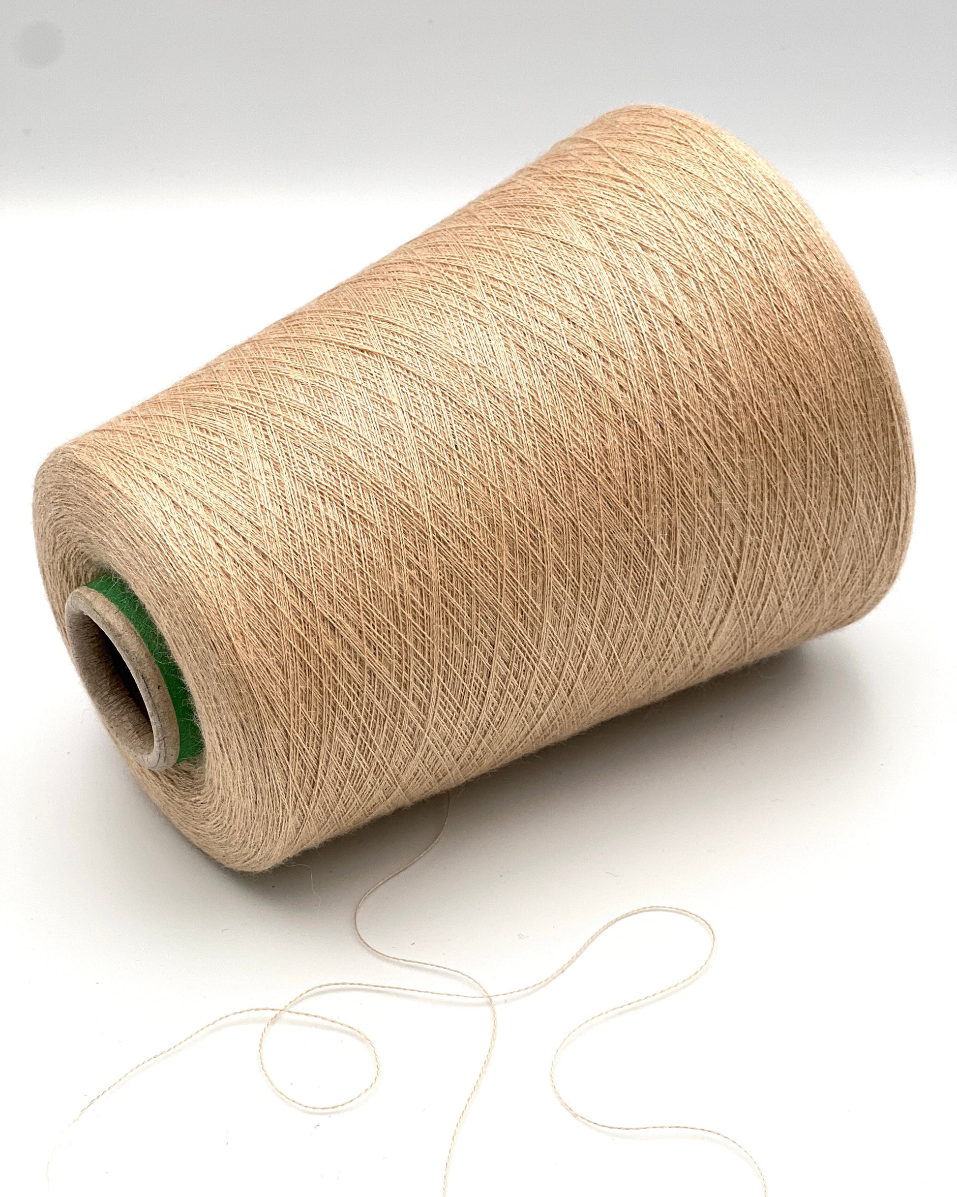 Rare vicuña silk yarn by Cariaggi on original luxury Italian cone
Cariaggi LAUREA 70 vicuña 30 silk couture lace yarn
Luxury Italian vicuña yarn close up showing ultra fine texture
Collector level vicuña silk yarn for weaving and couture knitting
Extremely rare Italian vicuña silk lace yarn on industrial cone