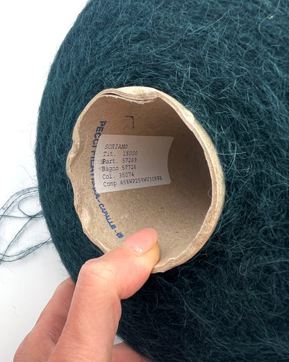Luxury alpaca merino yarn SORIANO by Pecci Filati Italy
Soft fluffy Italian lace yarn with elegant alpaca halo
Pecci Filati SORIANO yarn close up showing airy texture
Luxury companion yarn for sweaters shawls and knitwear
Italian alpaca merino lace yarn for soft fluffy knitting