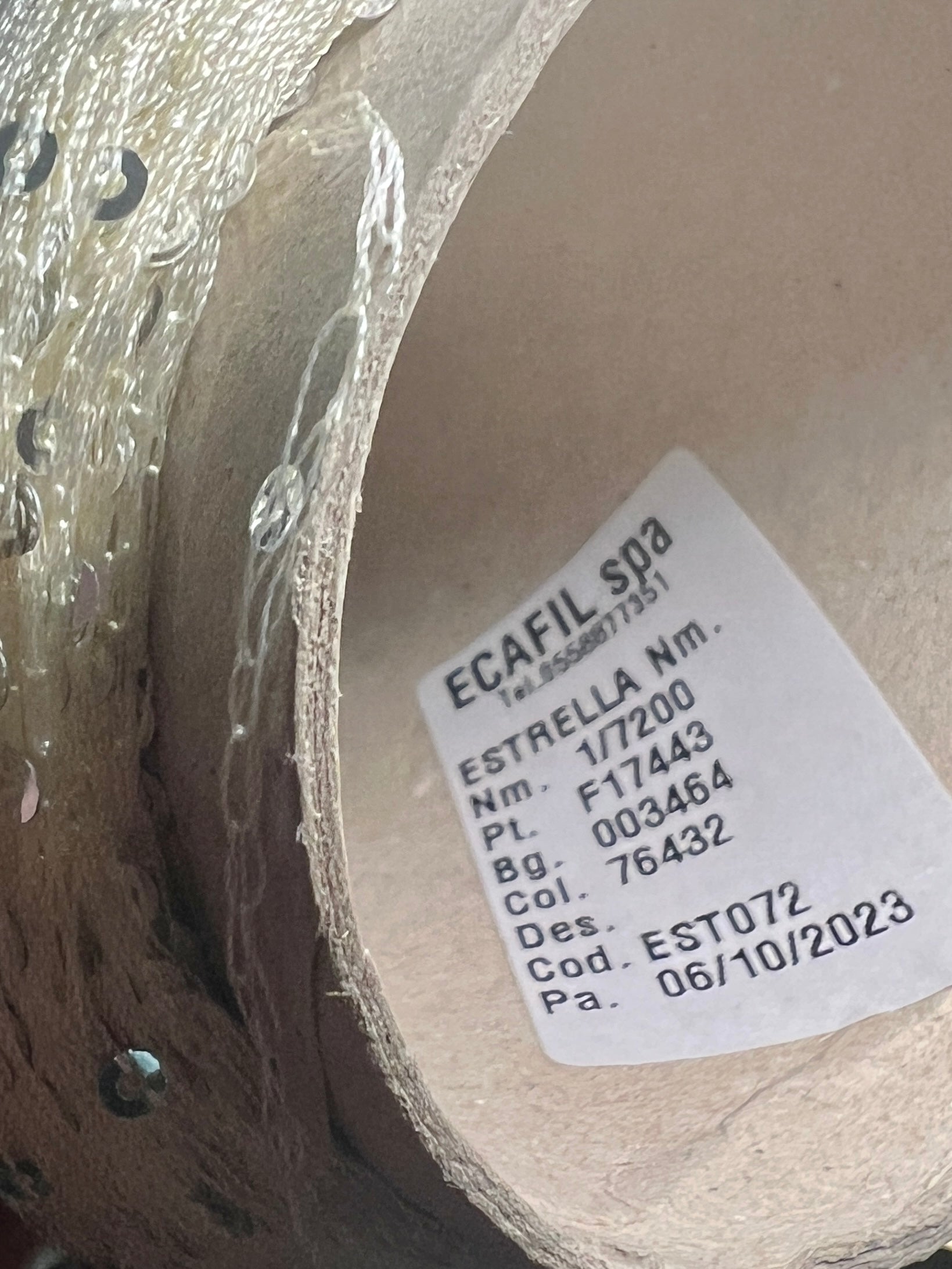 Luxury Italian paillettes yarn ESTRELLA by ECAFIL
Soft chainette sequin yarn on original cone
Italian fashion paillettes yarn for luxury knitwear
Designer companion yarn with integrated paillettes
Luxury Italian cone yarn with silver and green paillettes