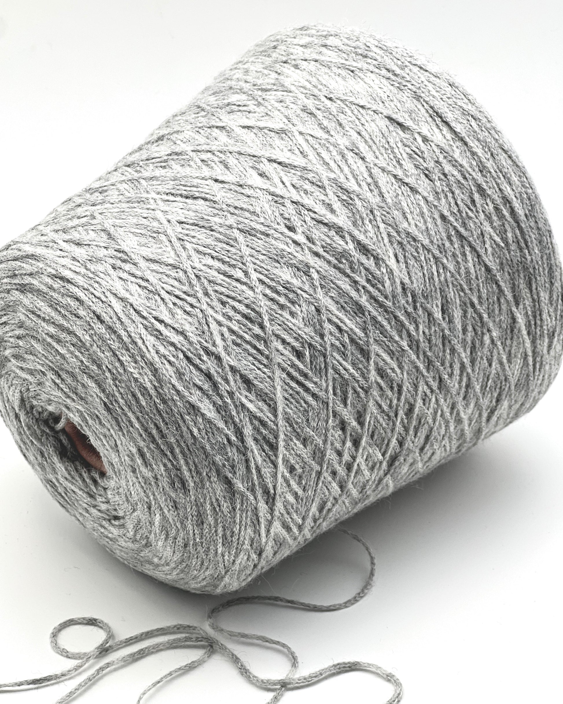 Gray skein of yarn on a white background