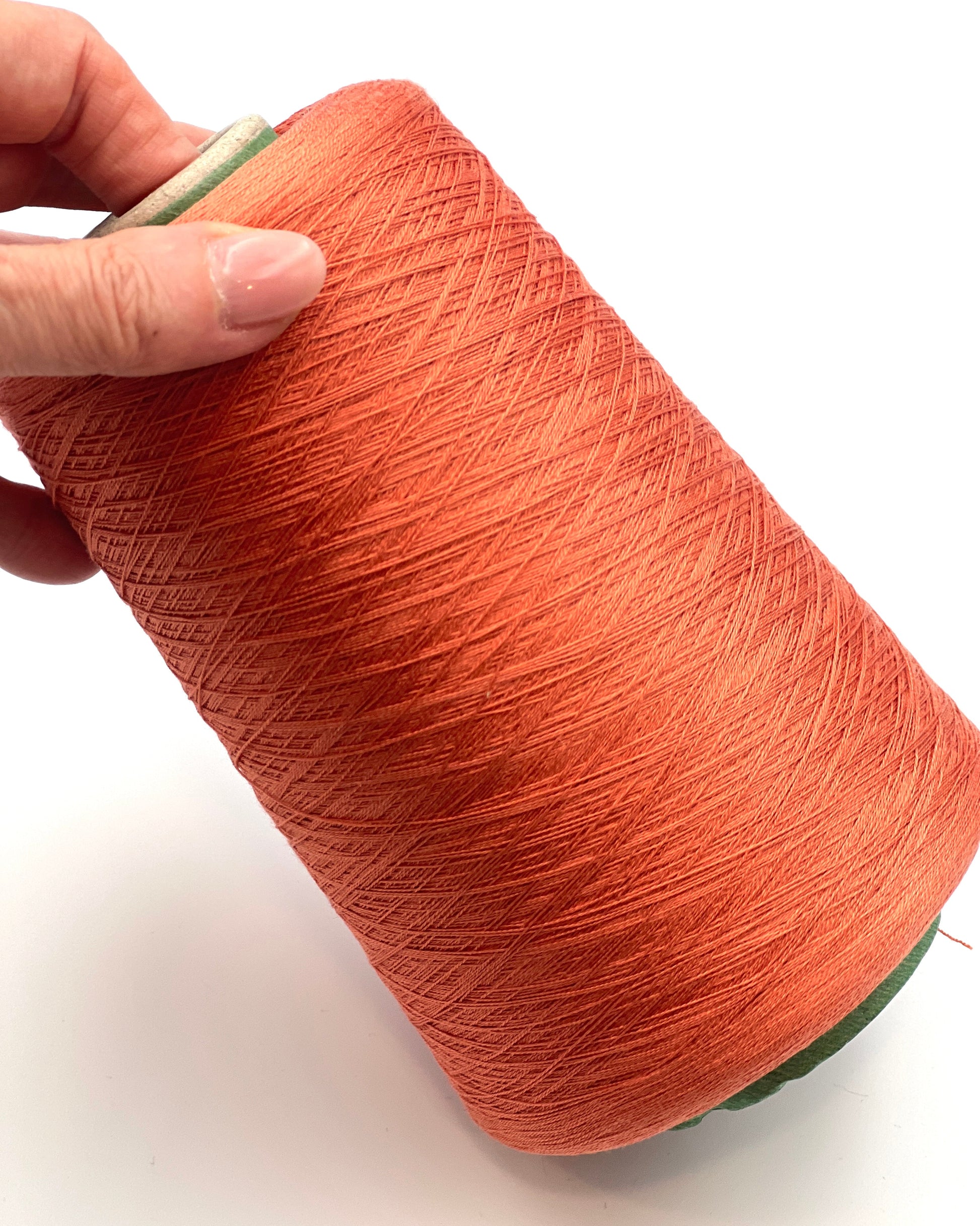 Servizi e Seta VISCOSETTE mulberry silk viscose lace-weight cone yarn in coral color with smooth texture, soft sheen, and elegant drape
