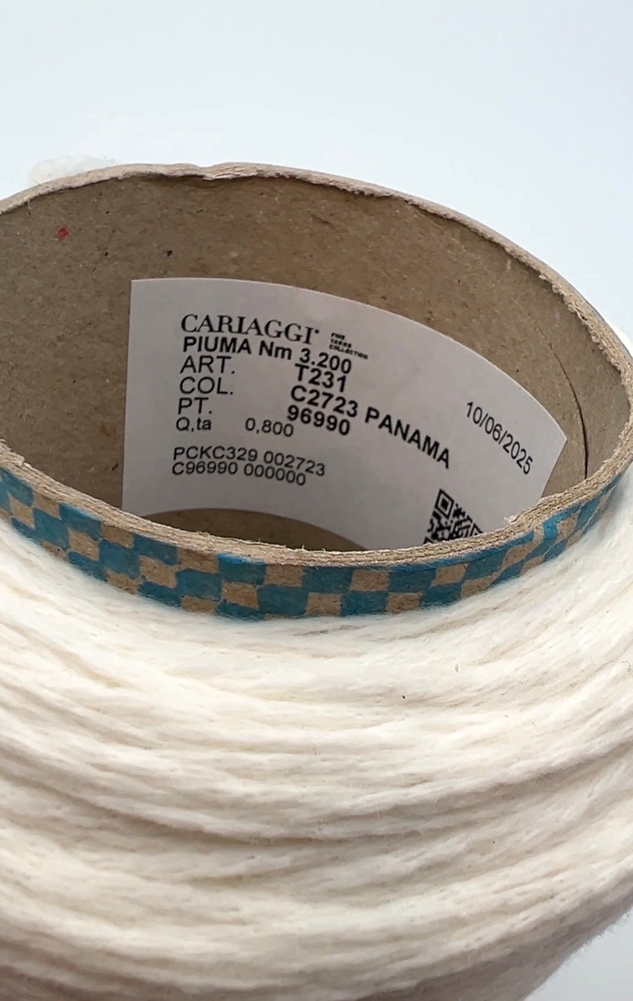 Rare CARIAGGI PIUMA 100% cashmere chainette yarn on original mill cone with original label and lofty cashmere texture.