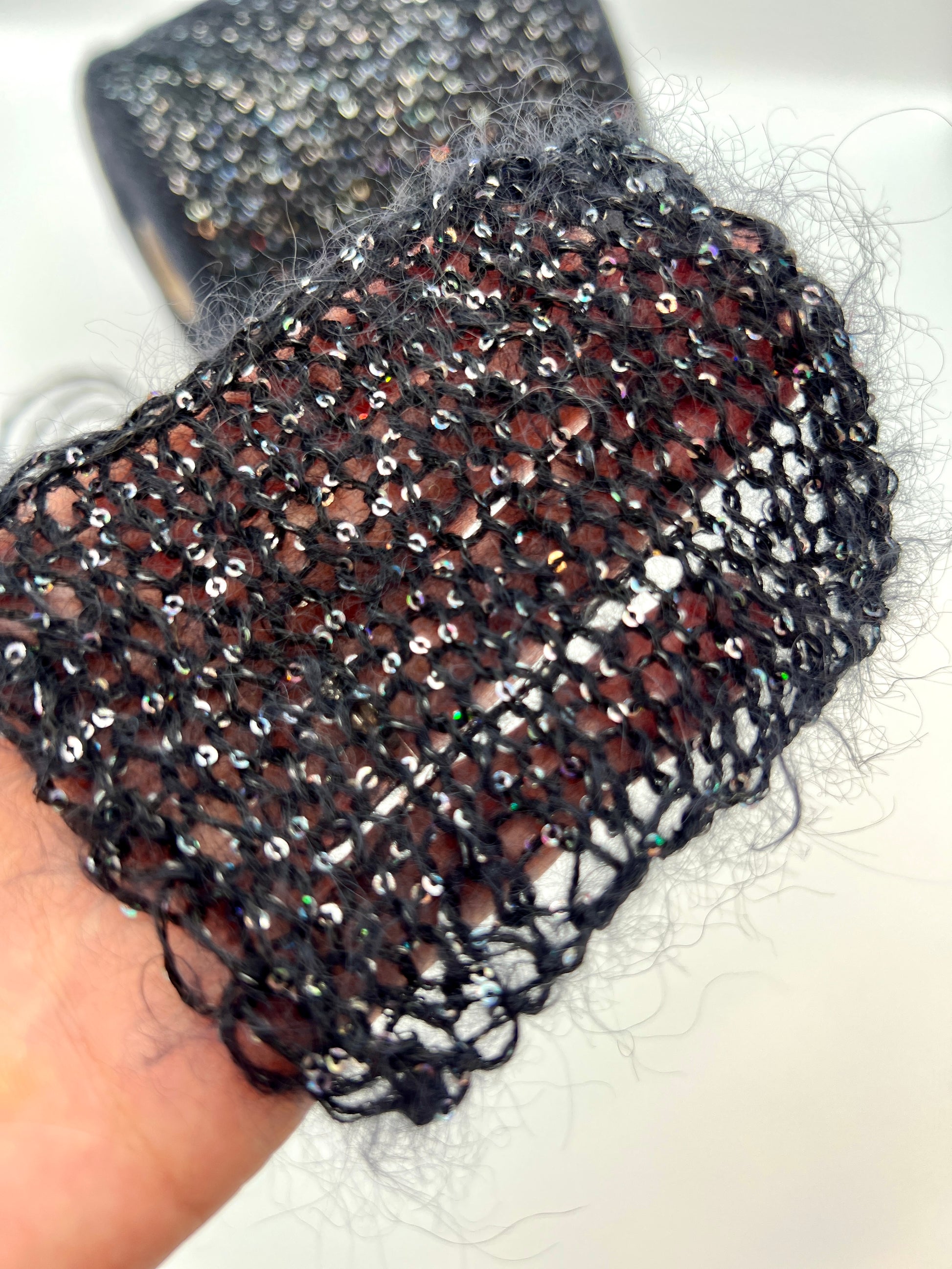 SESIA BOREALE Baby Suri Alpaca sequin yarn with holographic sparkle, luxury Italian halo yarn for sweaters, shawls, cardigans, and accessories.