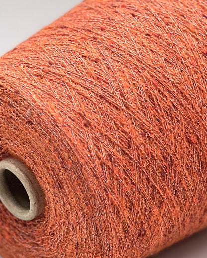 Exclusive iDOKNiT extra fine lace weight yarn, TORRONCINO by Pecci Filati Italy. A luxury fashion tweed yarn blend of 10% cashmere, 48% cotton, 20% merino wool, and 22% polyamide providing 700m per 100g. Authentic Italian-made premium fiber curated by iDOKNiT for lightweight standalone knitting, fine gauge machine knitting, and carrying with companion bases.