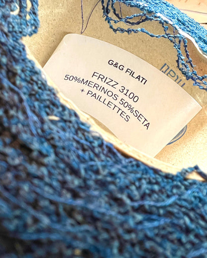 G&G Filati FRIZZ luxury 50% merino wool and 50% silk blend Italian sport weight fantasy boucle yarn in Midnight Blue with integrated 2mm transparent paillettes sequins for runway-ready fashion knitwear at iDOKNiT.