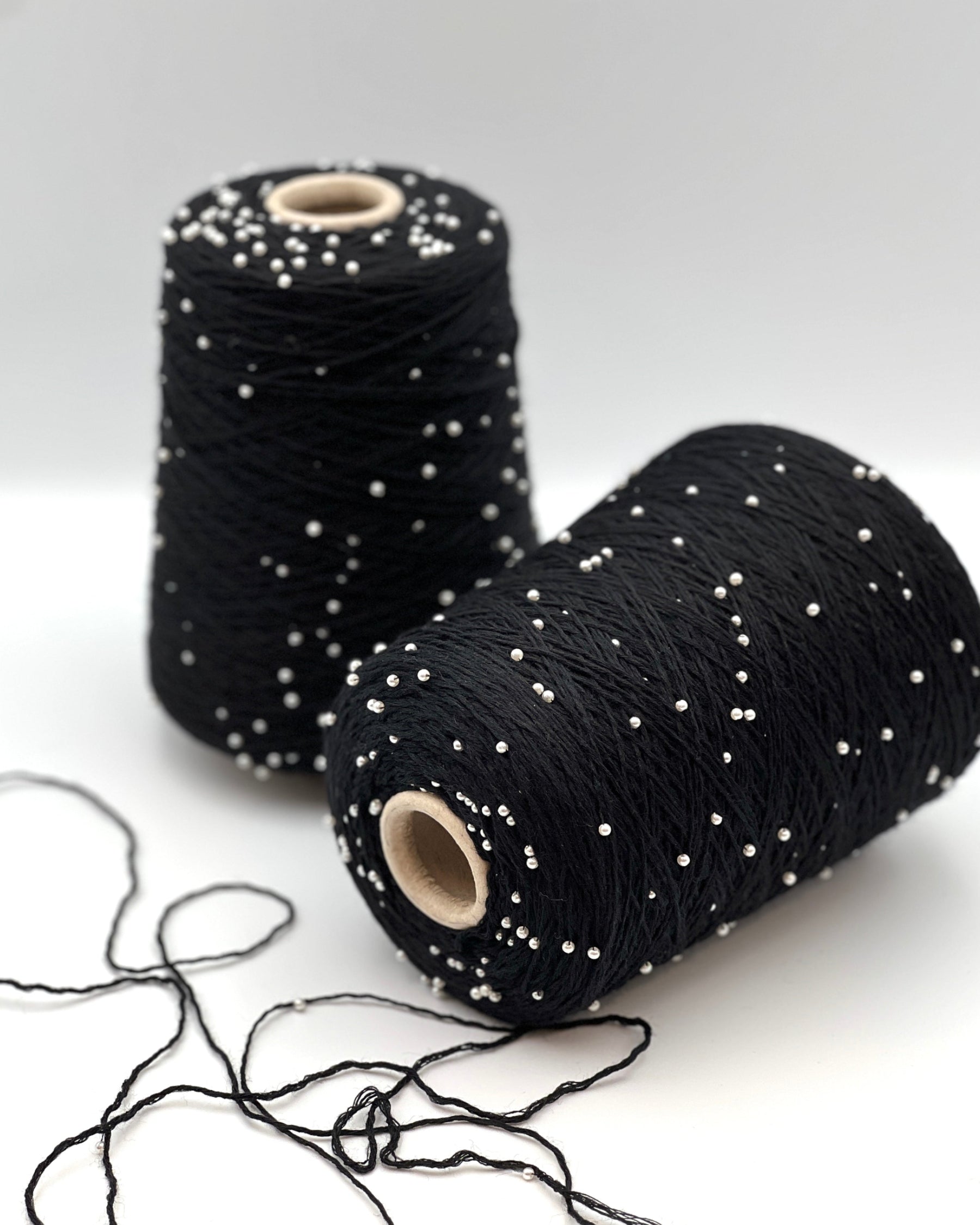 G&G Filati BON-BON luxury 100% merino wool single ply sport weight yarn integrated with generously spaced perline pearl beads on original industrial cones for Brunello Cucinelli inspired knitwear at iDOKNiT.