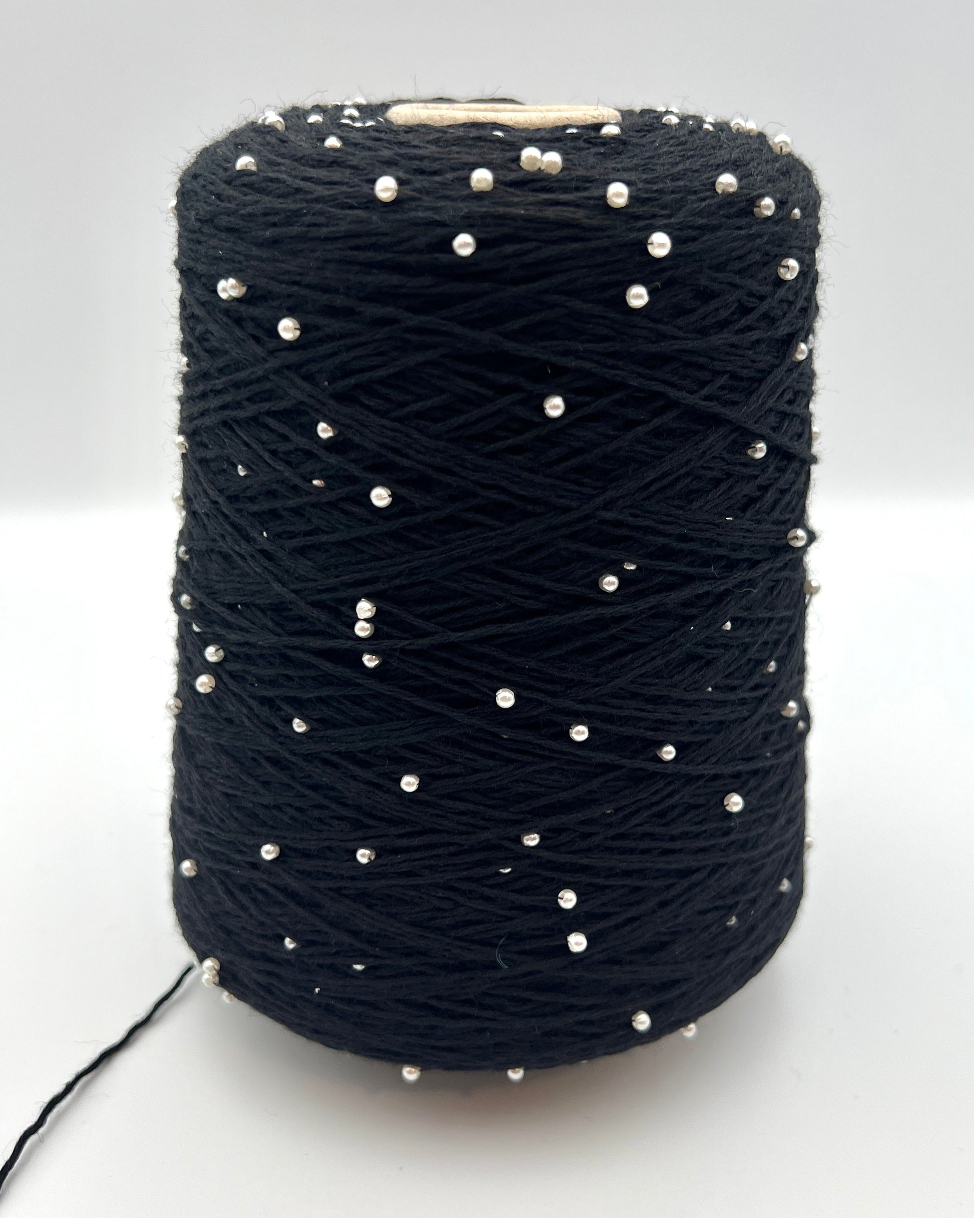 G&G Filati BON-BON luxury 100% merino wool single ply sport weight yarn featuring integrated, generously spaced perline pearl beads wound on an industrial cone for high-end boutique knitwear.