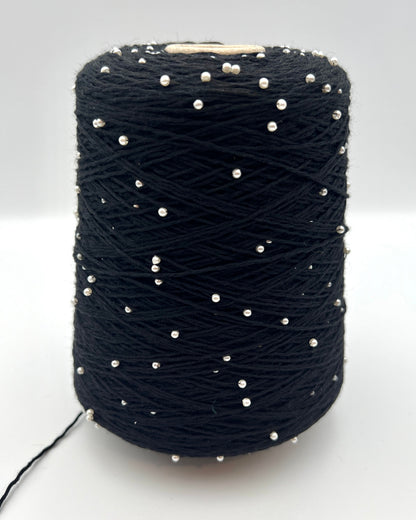 G&G Filati BON-BON luxury 100% merino wool single ply sport weight yarn featuring integrated, generously spaced perline pearl beads wound on an industrial cone for high-end boutique knitwear.