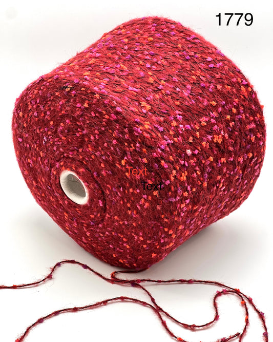 COLOR 1779 RED MULTI - Red speckled yarn ball with 'Text' label on a white background