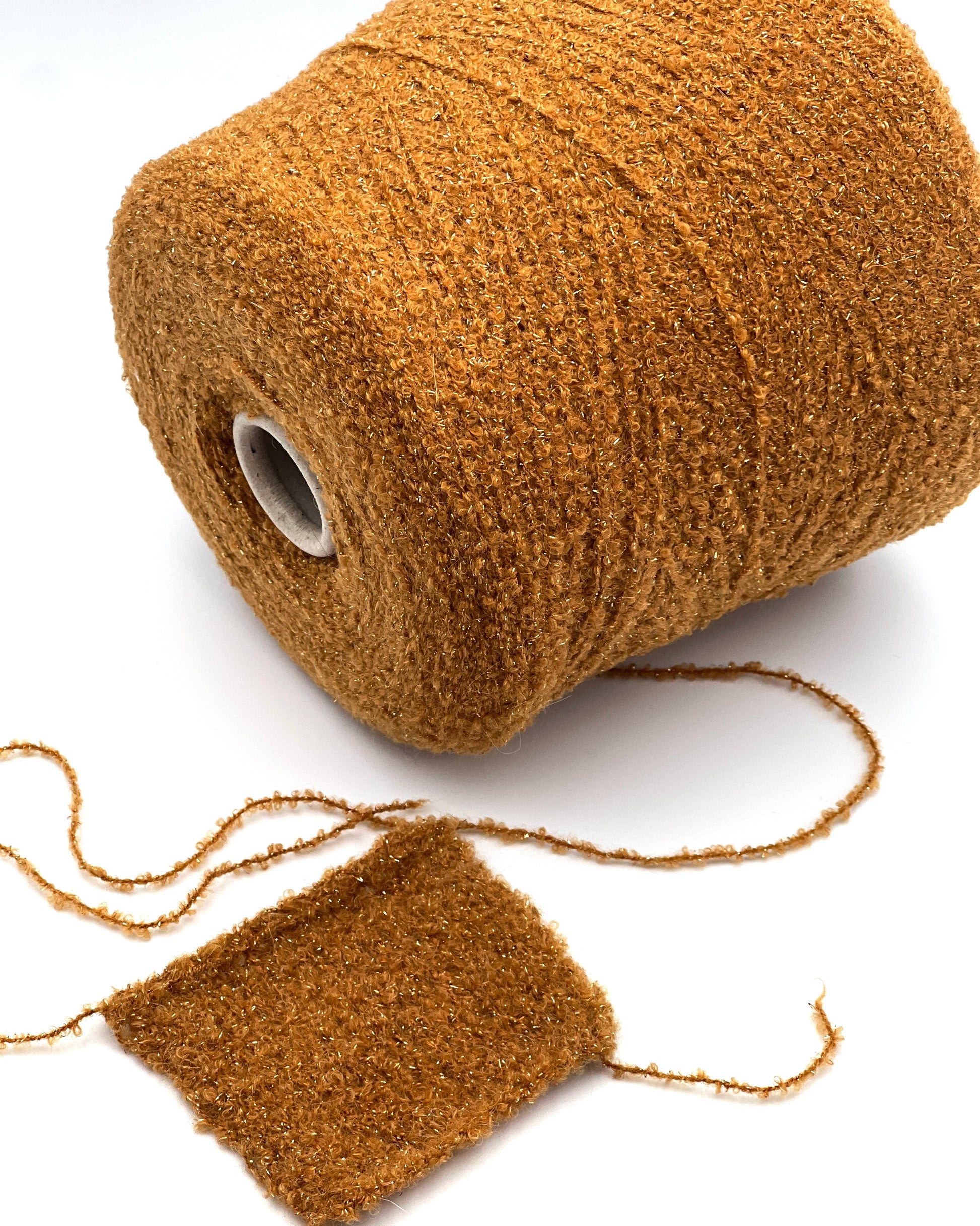 Lanificio Dell Olivo Lumiere Italian alpaca wool boucle fingering weight yarn with integrated metallic lurex on cone from iDOKNiT