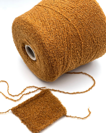 Lanificio Dell Olivo Lumiere Italian alpaca wool boucle fingering weight yarn with integrated metallic lurex on cone from iDOKNiT