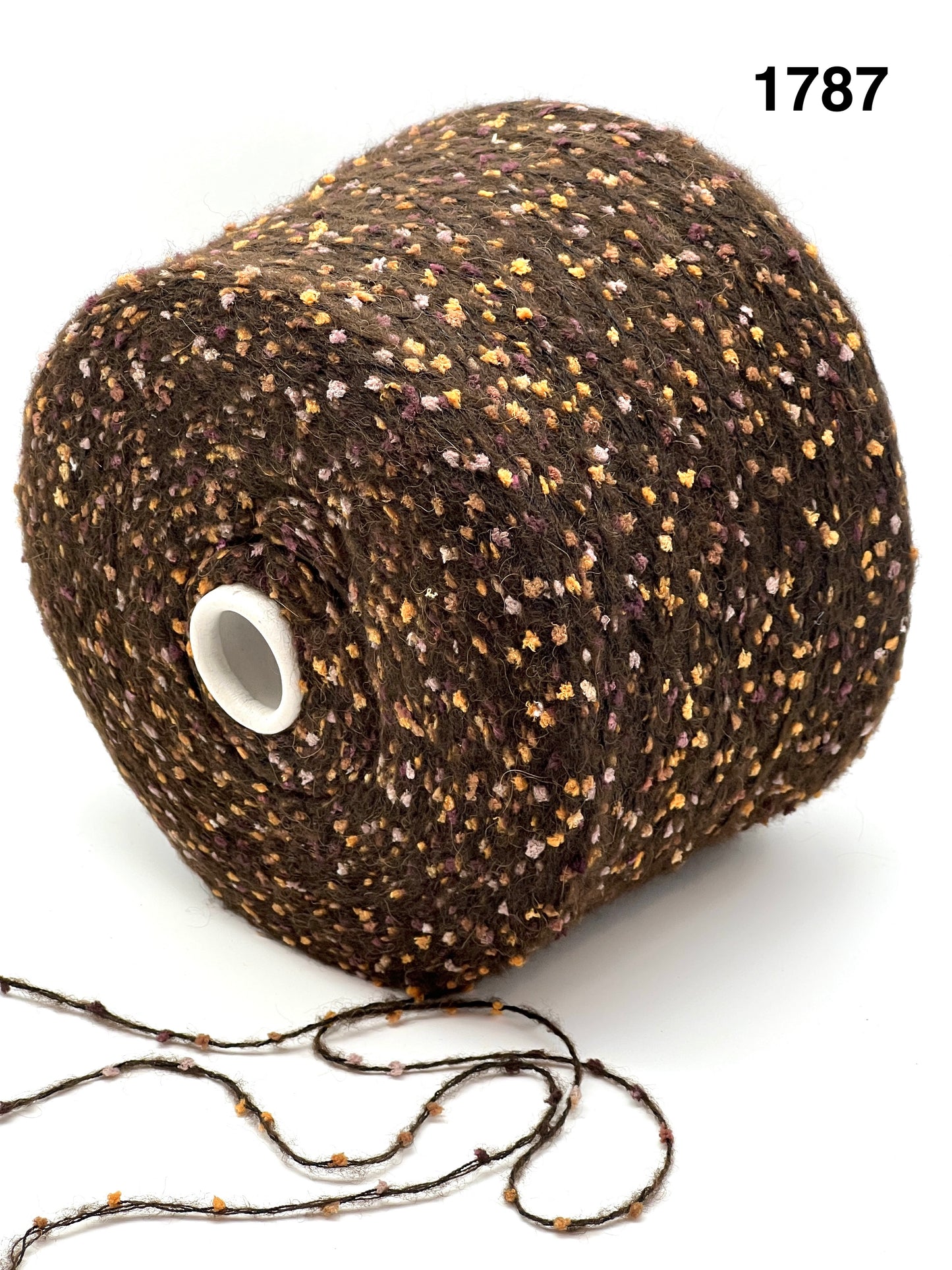 COLOR 1787 DARK CHOCOLATE MULTI - Spool of brown yarn with speckles on a white background