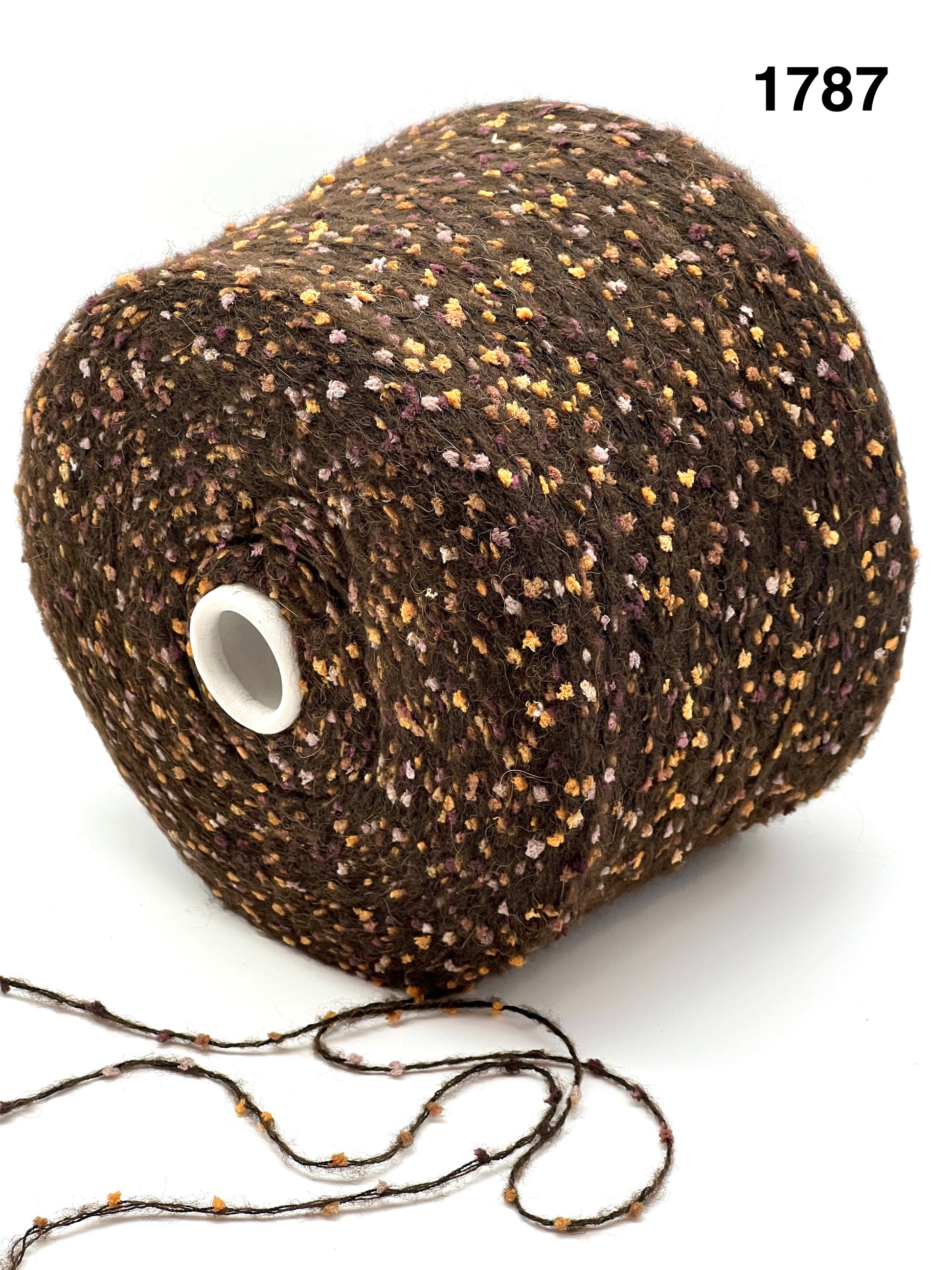 COLOR 1787 DARK CHOCOLATE MULTI - Spool of brown yarn with speckles on a white background