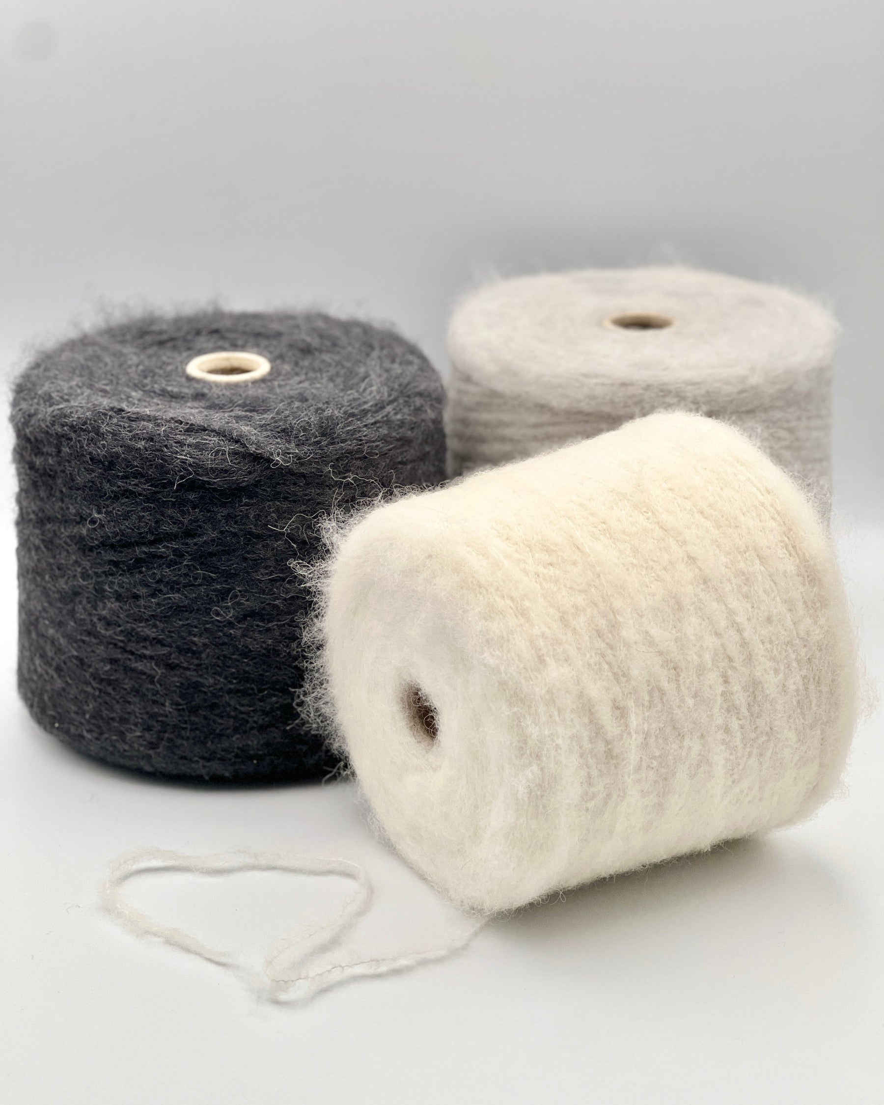 Polipeli Spa Etereog Italian brushed blown baby alpaca fingering weight yarn in hand wound balls from iDOKNiT