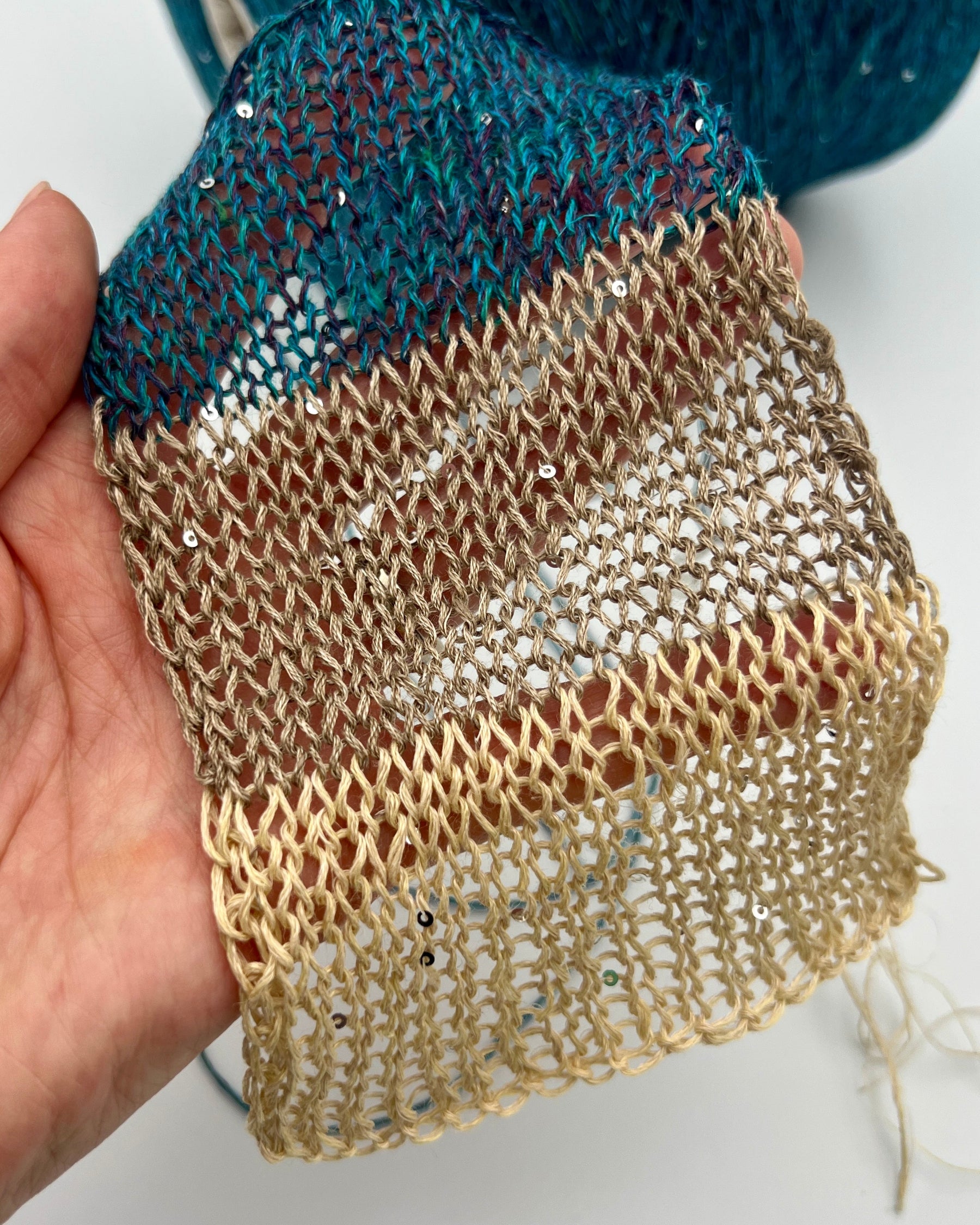 Rigo Saint Tropez linen silk silver paillette fingering weight yarn in balls from iDOKNiT