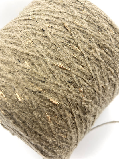 Close-up of a skein of gray yarn on a white background