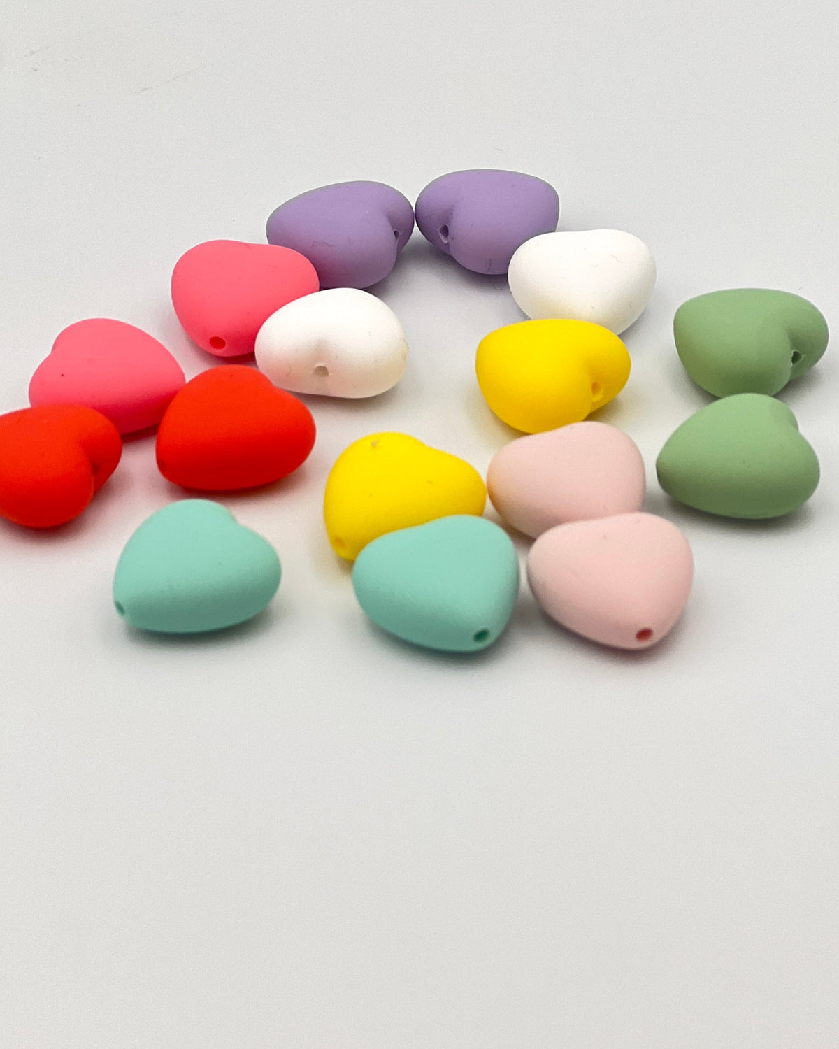 iDOKNiT silicone heart shaped knitting needle stoppers and point protectors pair