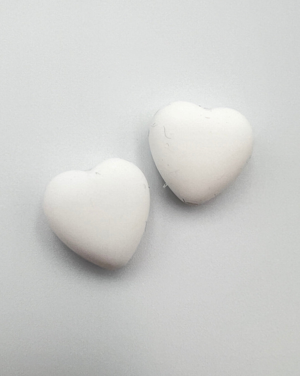 iDOKNiT silicone heart shaped knitting needle stoppers and point protectors pair