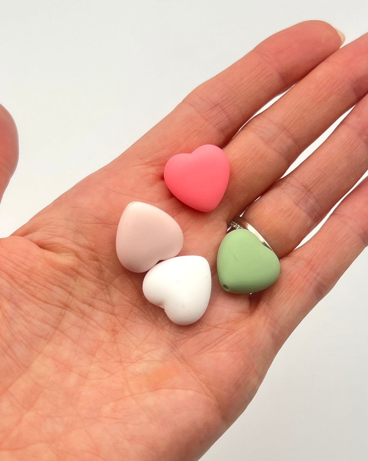 iDOKNiT silicone heart shaped knitting needle stoppers and point protectors pair
