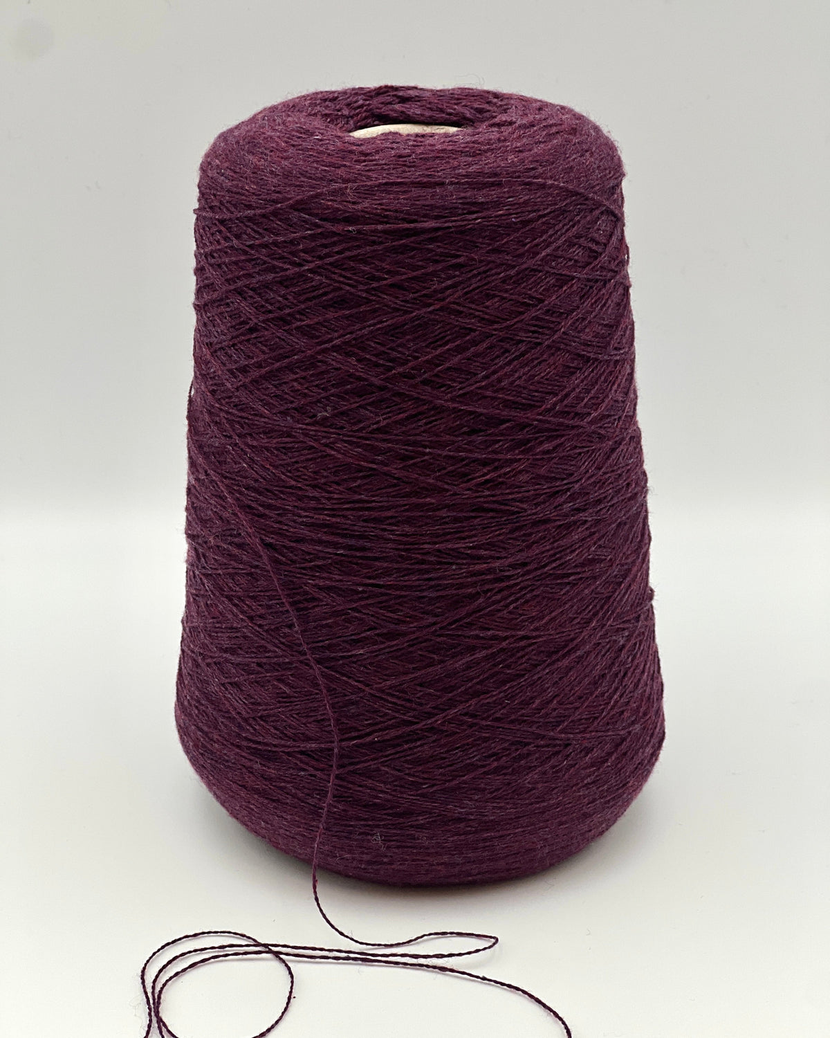 Loro Piana 50 percent baby vicuna 50 percent cashmere Italian ultra-fine lace yarn on original cone in Violetto Melange from iDOKNiT