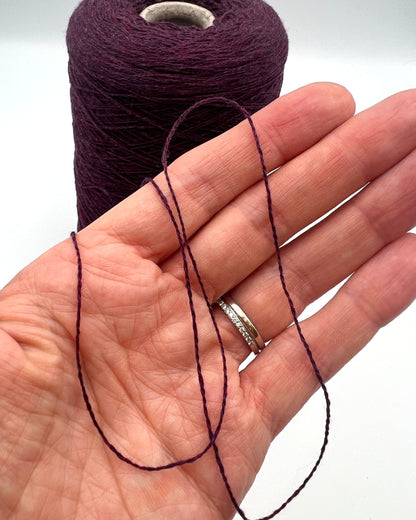 Loro Piana 50 percent baby vicuna 50 percent cashmere Italian ultra-fine lace yarn on original cone in Violetto Melange from iDOKNiT