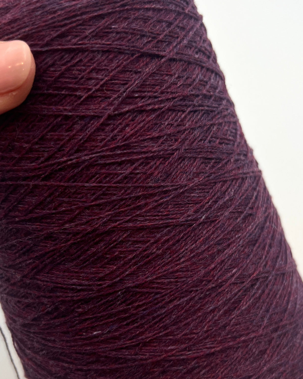 Loro Piana 50 percent baby vicuna 50 percent cashmere Italian ultra-fine lace yarn on original cone in Violetto Melange from iDOKNiT