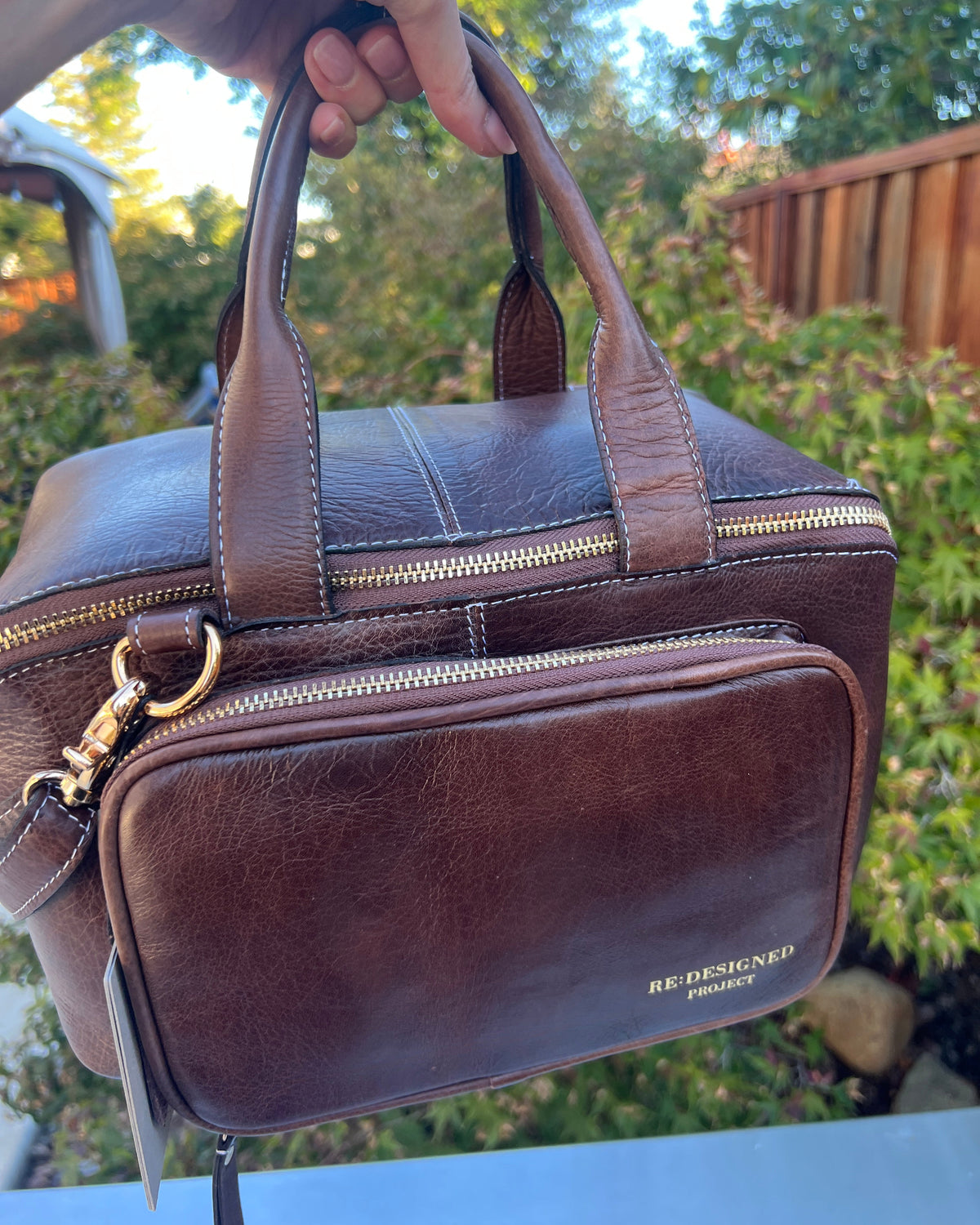 RE PROJECT 39 handcrafted Urban Leather knitting and crochet crossbody bag with top handles and front pocket from iDOKNiT