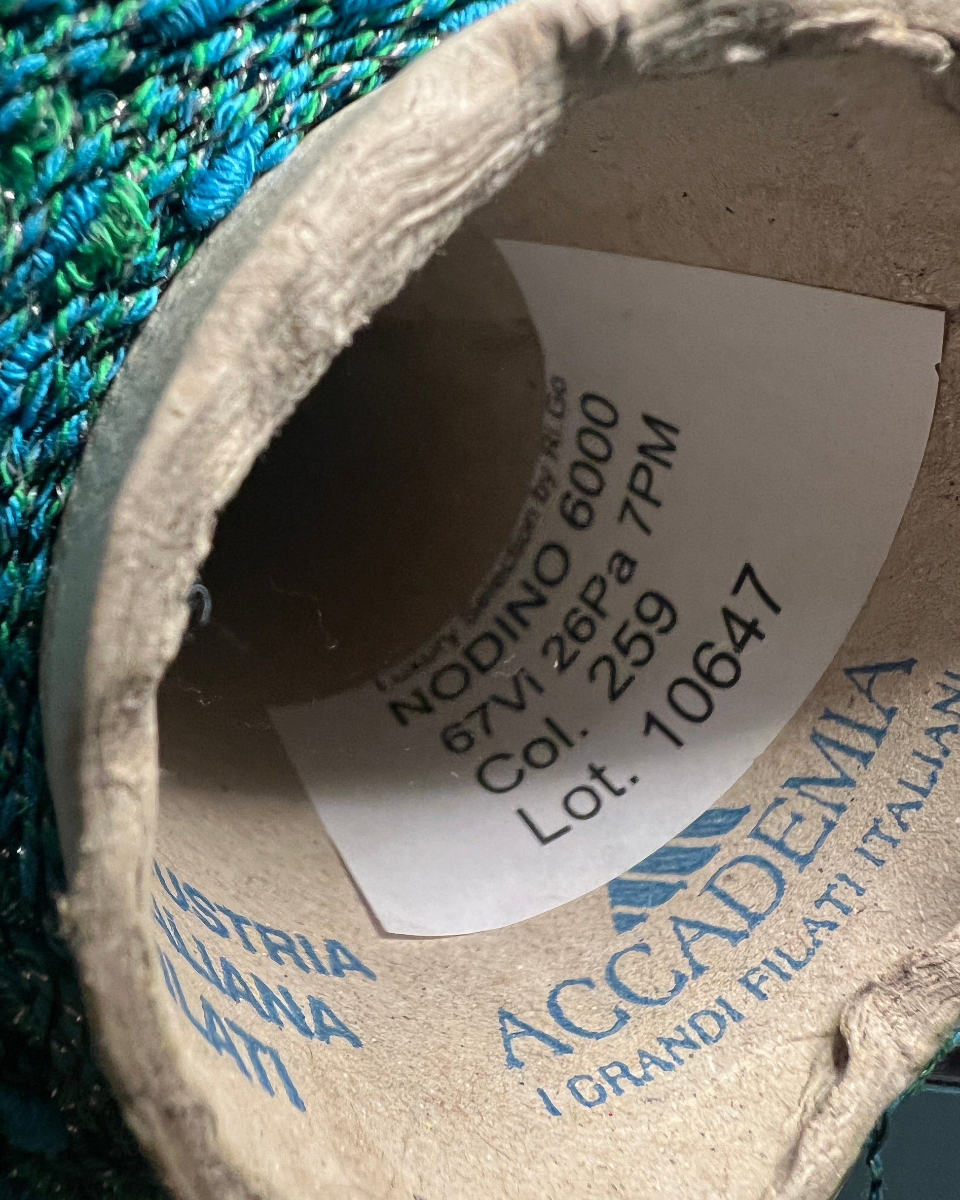 Exclusive iDOKNiT RiGo NODINO lace yarn featuring a radiant 67% viscose and 7% Lurex blend with a decorative Shishibriki texture for sophisticated Italian knitwear.