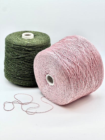 Professional grade RiGo STELLATO sport weight yarn from iDOKNiT, featuring a sophisticated 60% Italian cotton base with 2mm integrated paillettes. This authentic Italian-made yarn is curated by iDOKNiT to provide a refined shimmer and luxury finish for elegant, high-performance knitting projects.