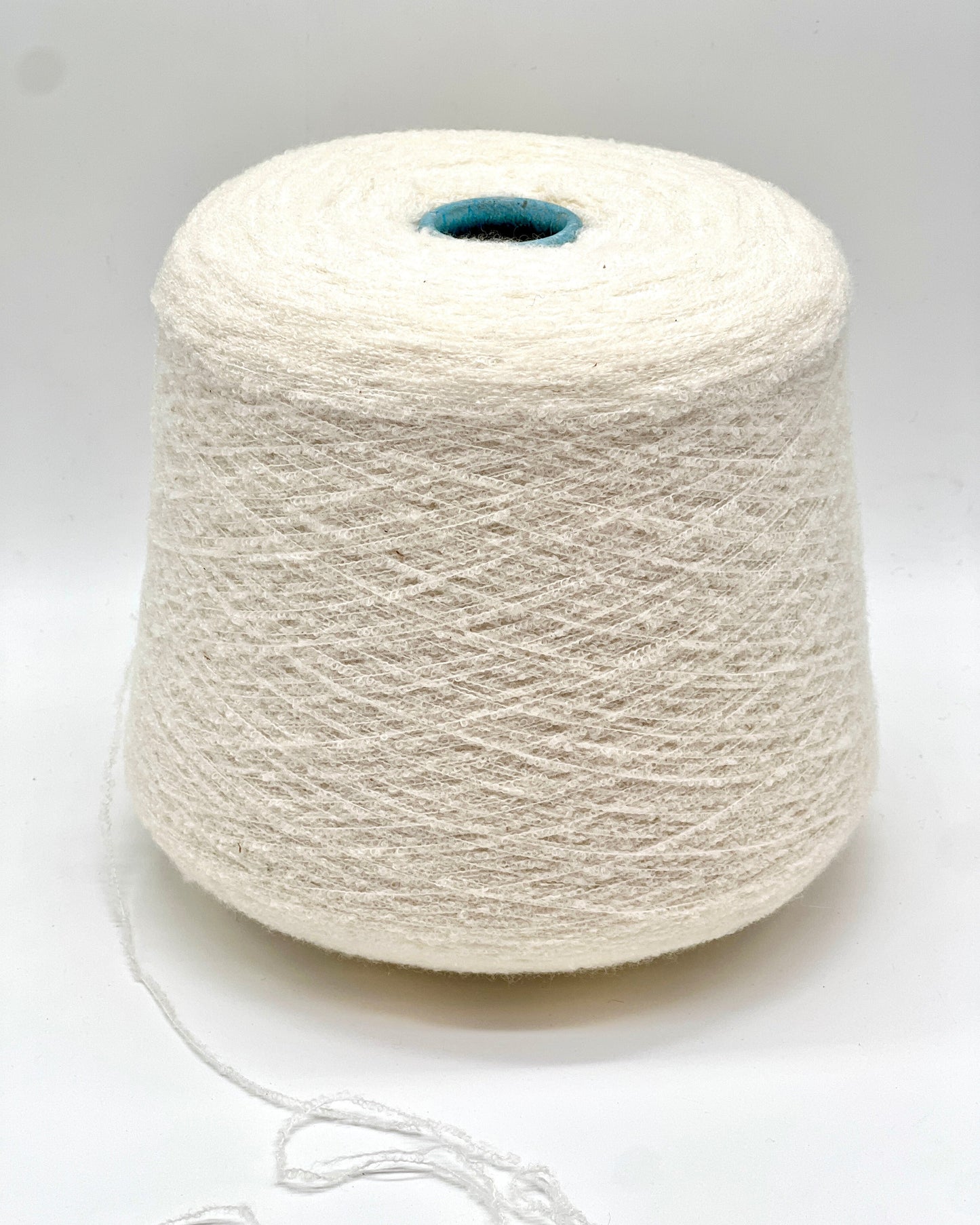 Elite iDOKNiT luxury micro-bouclé yarn, ESTRO by Zegna Baruffa Italy. 78% cashmere lace weight, Nm 9500. Authentic Italian-made soft airy loop yarn curated by iDOKNiT for professional knitting.