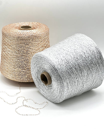 Elite iDOKNiT decorative lace weight yarn, SEQUINS by Cofil Italy. 100% polyester with micro-sequins, 460m/100g. Authentic Italian-made sparkling carry-along yarn curated by iDOKNiT to add texture and shine to professional knitting projects.