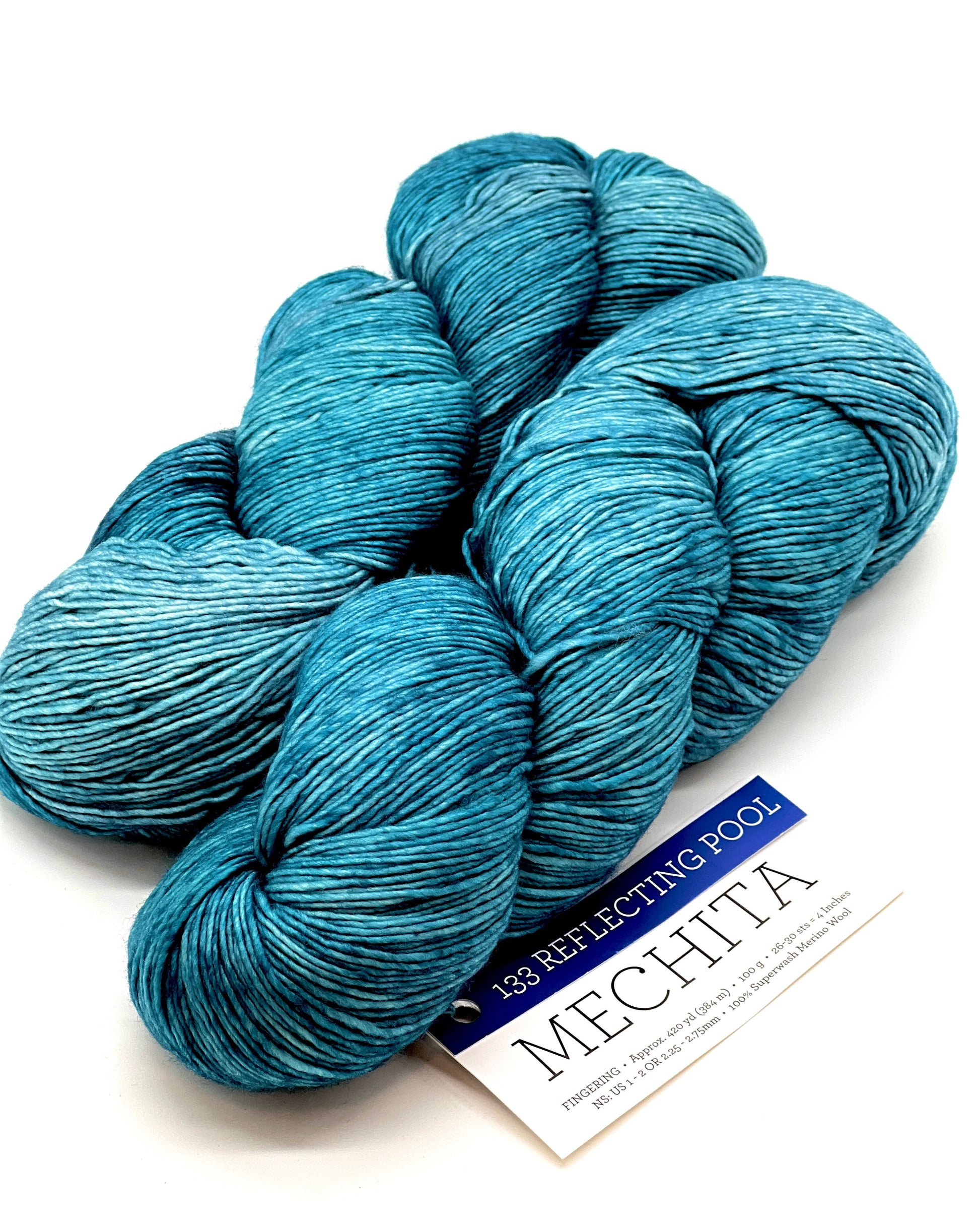 Premium iDOKNiT fingering weight yarn, MECHITA by Malabrigo Peru. 100% superwash merino wool, single-ply construction for elegant drape, 384m/100g. Hand-dyed authentic Peruvian yarn curated by iDOKNiT for soft, vibrant, and professional knitting projects.