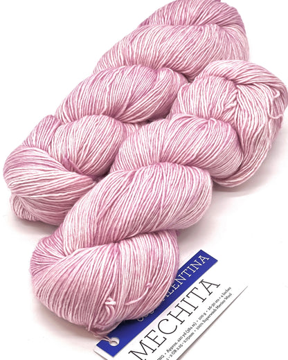 Premium iDOKNiT fingering weight yarn, MECHITA by Malabrigo Peru. 100% superwash merino wool, single-ply construction for elegant drape, 384m/100g. Hand-dyed authentic Peruvian yarn curated by iDOKNiT for soft, vibrant, and professional knitting projects.