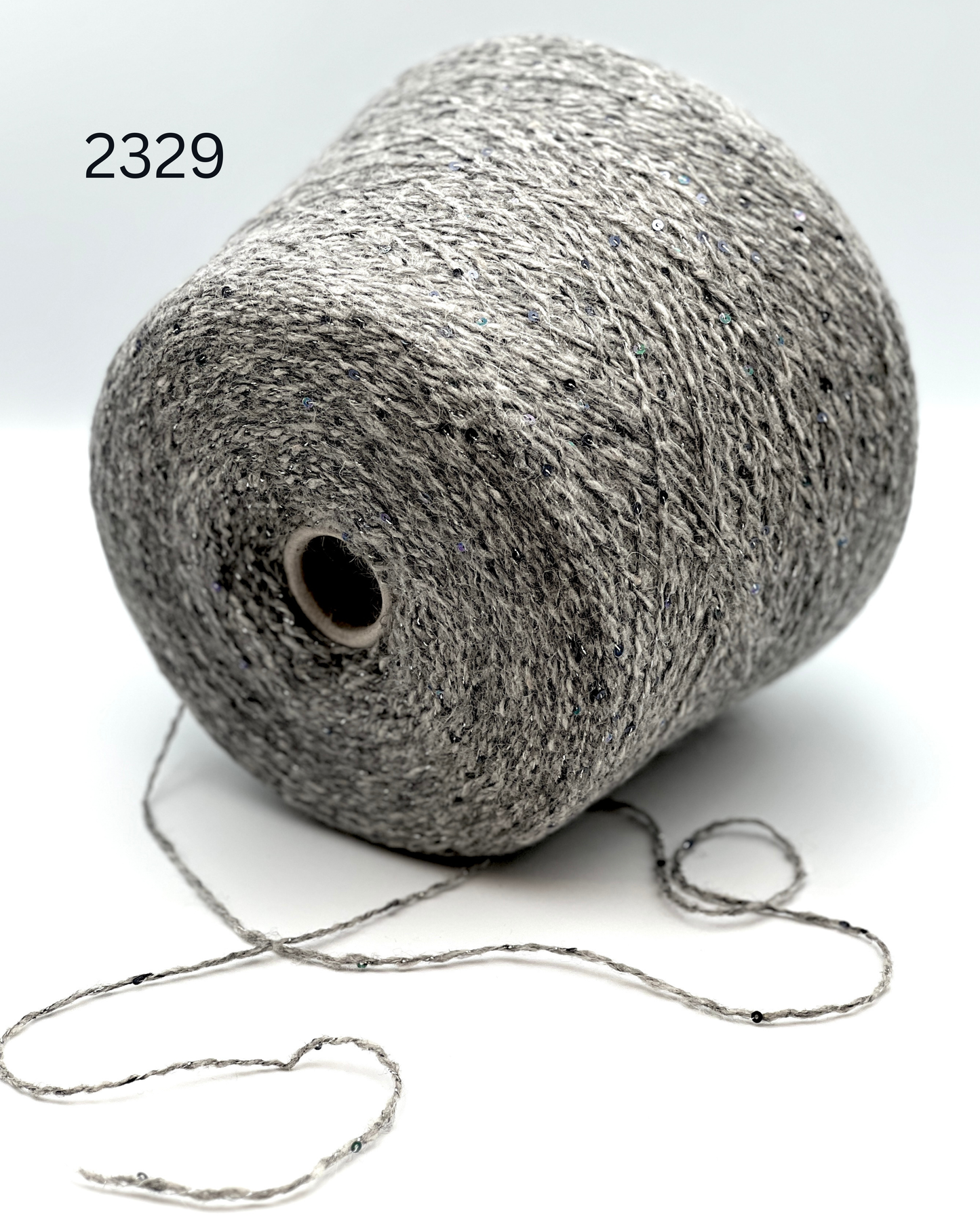 Wool mohair lurex sequin yarn NELSON with Italian fashion texture
Luxury Italian DK yarn with 2mm paillettes and soft mohair halo
Industria Italiana Filati NELSON yarn close up with shimmer
Wool mohair sparkle yarn for sweaters cardigans and scarves
Italian fashion yarn with lurex paillettes and textured halo