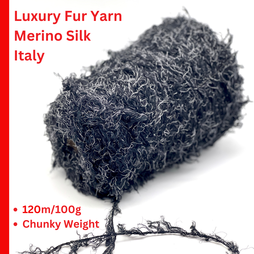 Luxury fluffy fur merino silk yarn WISH GLOW Italy
black furry chunky yarn with grey fibers designer texture
Italian fluffy statement yarn for sweaters jackets and scarves
dramatic fur effect merino silk yarn close up texture
couture style fluffy winter yarn cone Italy